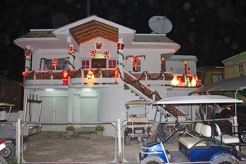 House with Christmas decoration in San Pedro in Ambergris Caye, Belize at night