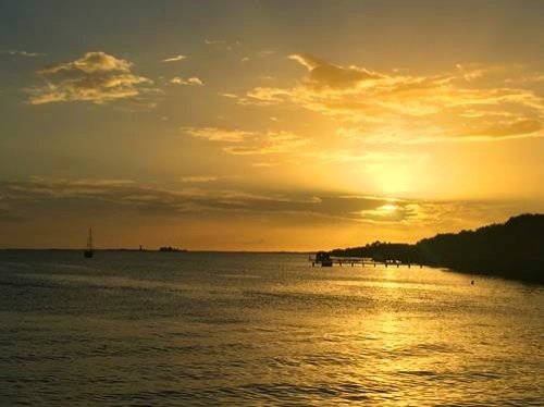 Sunset over the ocean in Placencia, Belize