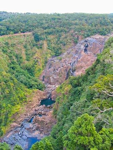 view on waterfalls from the Kuranda Scenic Railway in Kuranda, Australia