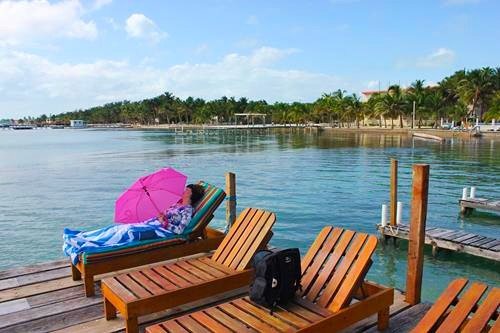 Dock with chairs in San Pedro in Ambergris Caye, Belize