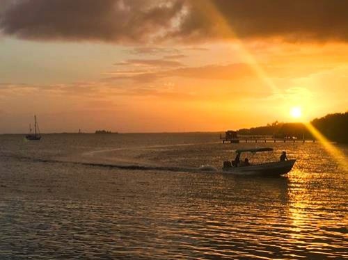 Sunset over the ocean in Placencia, Belize