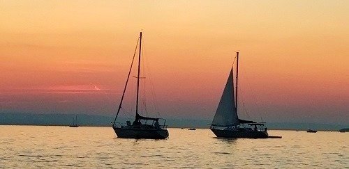 Boats at Sunset at Oakledge Park at the 3rd of July Fireworks in Shelburne, Vermont