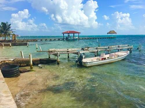 Dock with a boat in San Pedro in Ambergris Caye, Belize