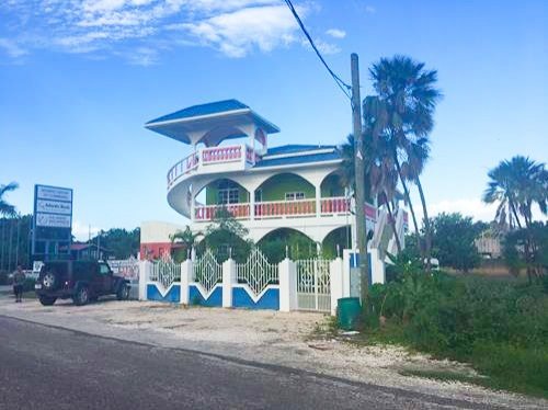 Colorful house on the main road in Placencia, Belize