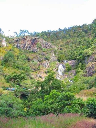 view on waterfalls from the Kuranda Scenic Railway in Kuranda, Australia