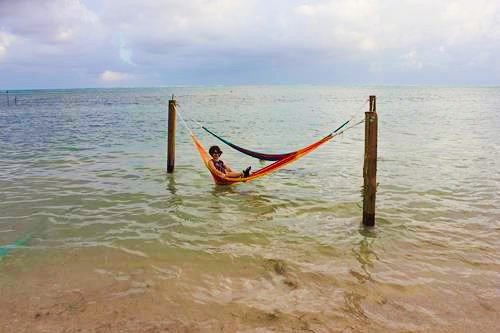 Hammock over water in San Pedro in Ambergris Caye, Belize
