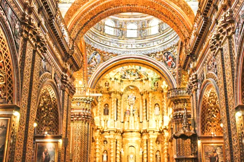 Golden interior of the Compania de Jesus church in quito in Ecuador