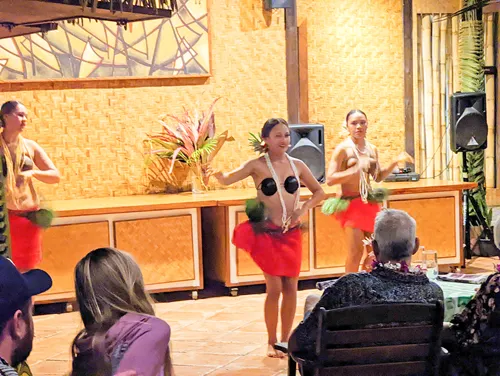 Native dance show at the Takurua Island Feast at the Tamanu Beach Resort in Aitutaki in the Cook Islands showing the stops in self-guided walking tour