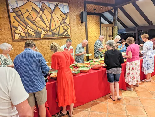 Buffet at the Takurua Island Feast at the Tamanu Beach Resort in Aitutaki in the Cook Islands showing the stops in self-guided walking tour