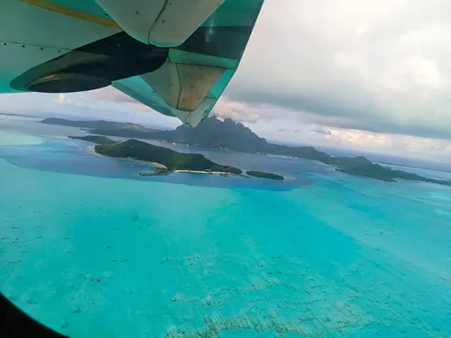 Aerial view on Bora Bora from a plane in French Polynesia