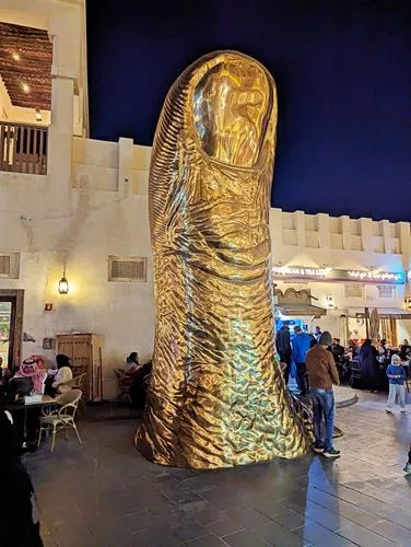 Golden Thumb Statue in Souq Waqif in Doha in Qatar
