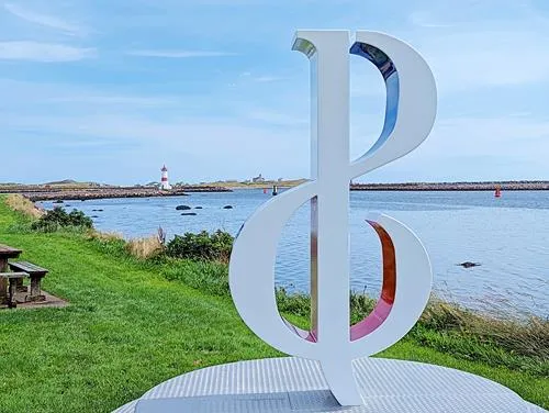 the SPM (St. Pierre and Miquelon) sign at Anse Coudreville in St. Pierre