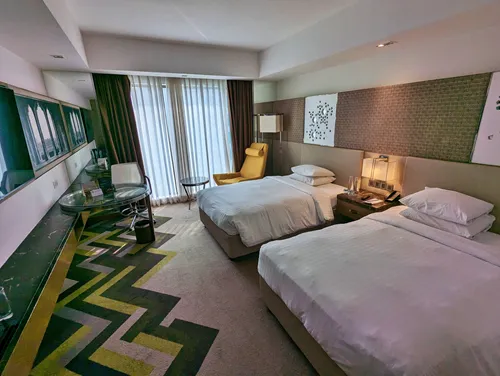 Bedroom at the Courtyard by Marriott Agra in India