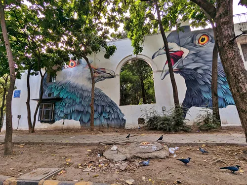 These Rock Pigeons Chose the Trees Mural at Lodhi Art District in Delhi in India