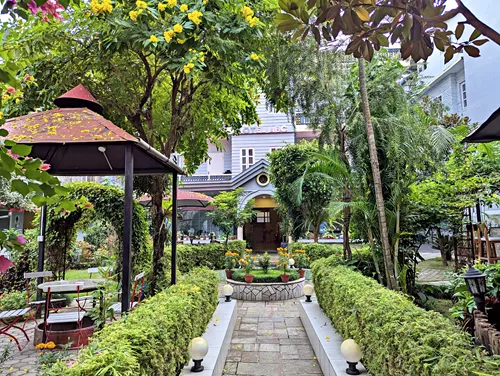 View of Hotel ABC Boutique Hotel in Pokhara from the front over the garden