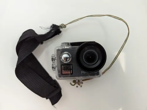 Underwater Camera in watertight housing with wrist strap