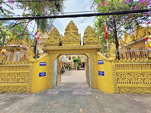 golden main entrance of Munirensay Temple in Can Tho in Vietnam