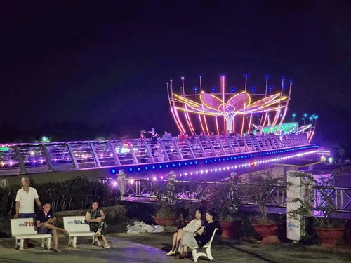 photo of the beautifully illuminated Can Tho Promenade at the waterfront in Can Tho, Vietnam in Vietnam