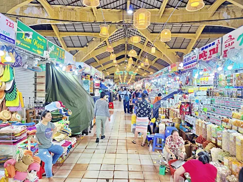 Shoppers shopping at the many stalls inside Ben Thanh Market in Ho Chi Minh City in Vietnam