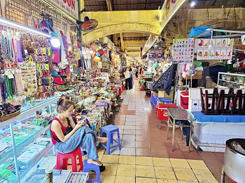 Shoppers shopping at the many stalls inside Ben Thanh Market in Ho Chi Minh City in Vietnam