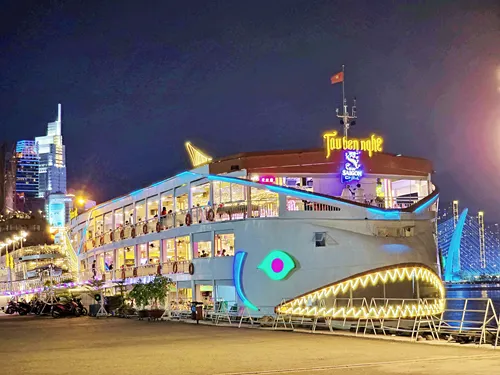 Beautifully illuminated ship for a Saigon River Dinner Cruise in Vietnam