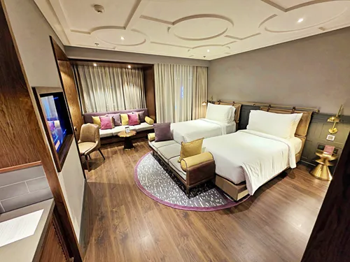 photo of a bedroom showing the beds at the Fusion Original Saigon Centre in Ho Chi Minh City in Vietnam