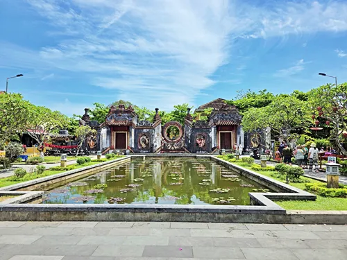 Ba Mu Temple Gate with Lotus Pond in Hoi An in Vietnam