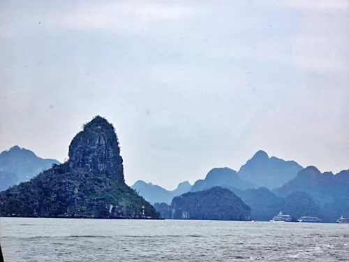 view of karst formations during the Transfer to your Cruise Ship for Ha Long Bay Area Cruises in Vietnam