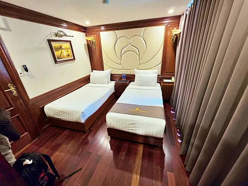 photo of a bedroom on the Calypso ship during a 2 day 1 night Lan Ha Bay cruise in Vietnam