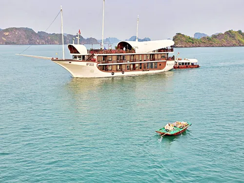 photo of another ship and karst formations seen from a Cruise Ship for Ha Long Bay Area Cruises in Vietnam