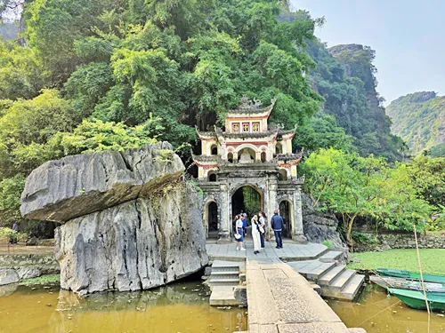 Scenic Lotus Pond and Entrance Bridge at Bich Dong Pagoda in Ninh Binh in Vietnam