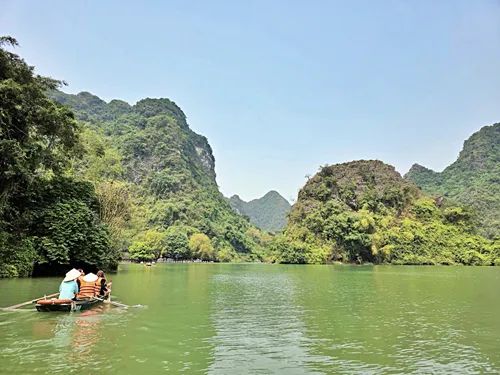 sampan ride to Trình Temple on Route 1 of the Trang An Boat near Ninh Binh in Vietnam
