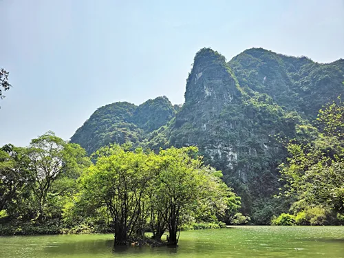 sampan ride to Hang Seo Cave on Route 1 of the Trang An Boat near Ninh Binh in Vietnam